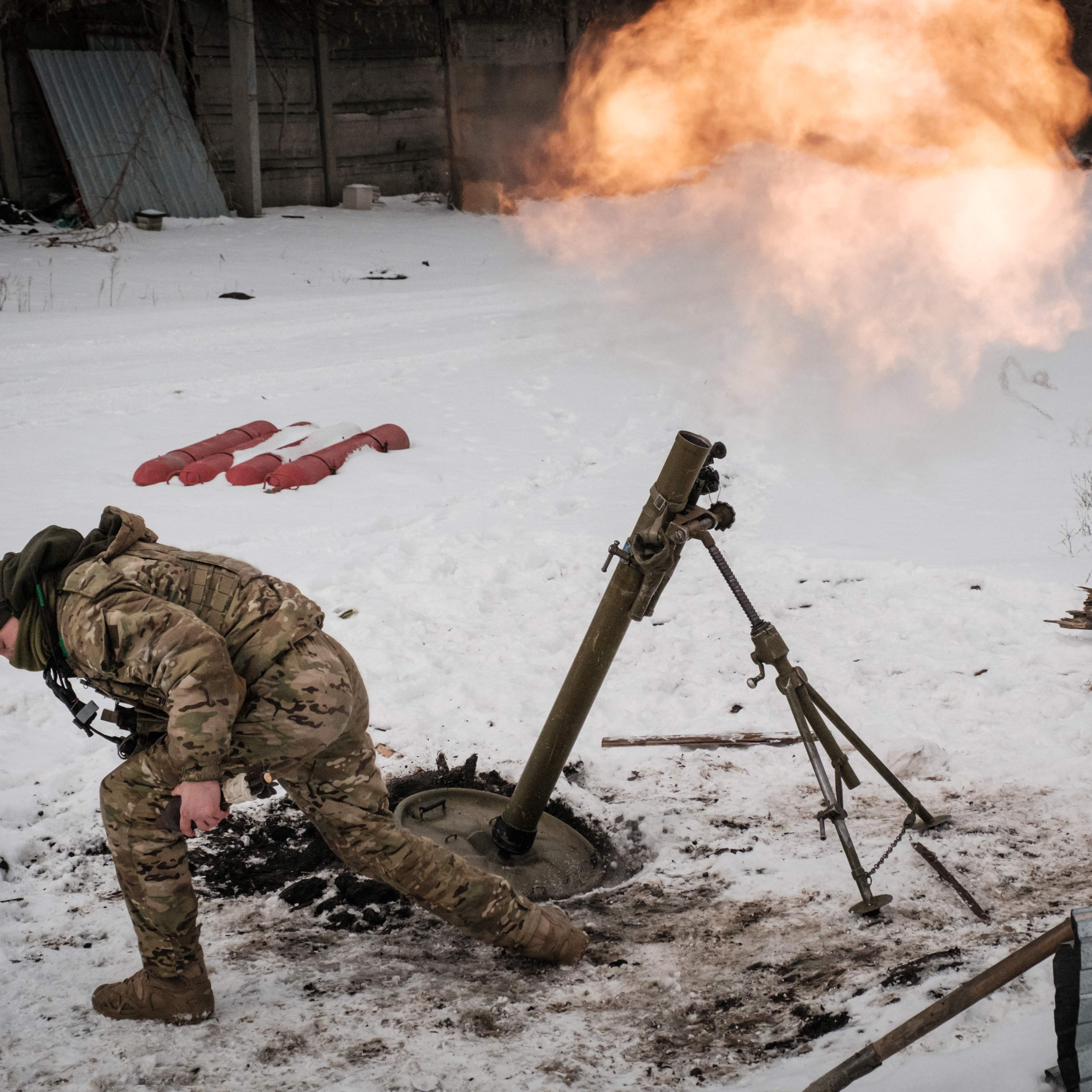 February 16, 2023: A Ukrainian serviceman of the State Border Guard Service fires a mortar toward the Russian position in Bakhmut as the head of Russia's mercenary outfit Wagner said it could take months to capture the embattled Ukraine city and slammed Moscow's "monstrous bureaucracy" for slowing military gains. - Russia has been trying to encircle the battered industrial city and wrest it ahead of Feb. 24, the first anniversary of what it terms its "special military operation" in Ukraine.