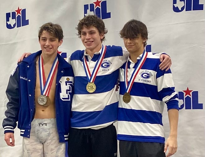 Georgetown's Jeremy Kelly, center, won a pair of individual gold medals Saturday night on the final day of the UIL state swimming and diving championships at the Jamail Texas Swimming Center. Kelly has won four golds over the past two state meets.