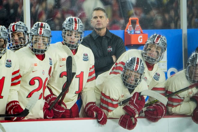 Feb 18, 2023; Cleveland, Ohio, USA;  Ohio State Buckeyes head coach Steve Rohlik watches during third period of the Faceoff on the Lake outdoor NCAA men’s hockey game against the Michigan Wolverines at FirstEnergy Stadium. Ohio State won 4-2. Mandatory Credit: Adam Cairns-The Columbus Dispatch