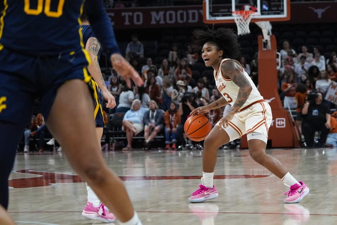 Texas point guard Rori Harmon directs the offense during the Longhorns' game against West Virginia on Feb. 19 at Moody Center. The Longhorns, seeded No. 4 in the NCAA Tournament, face East Carolina on Saturday night in the first round.