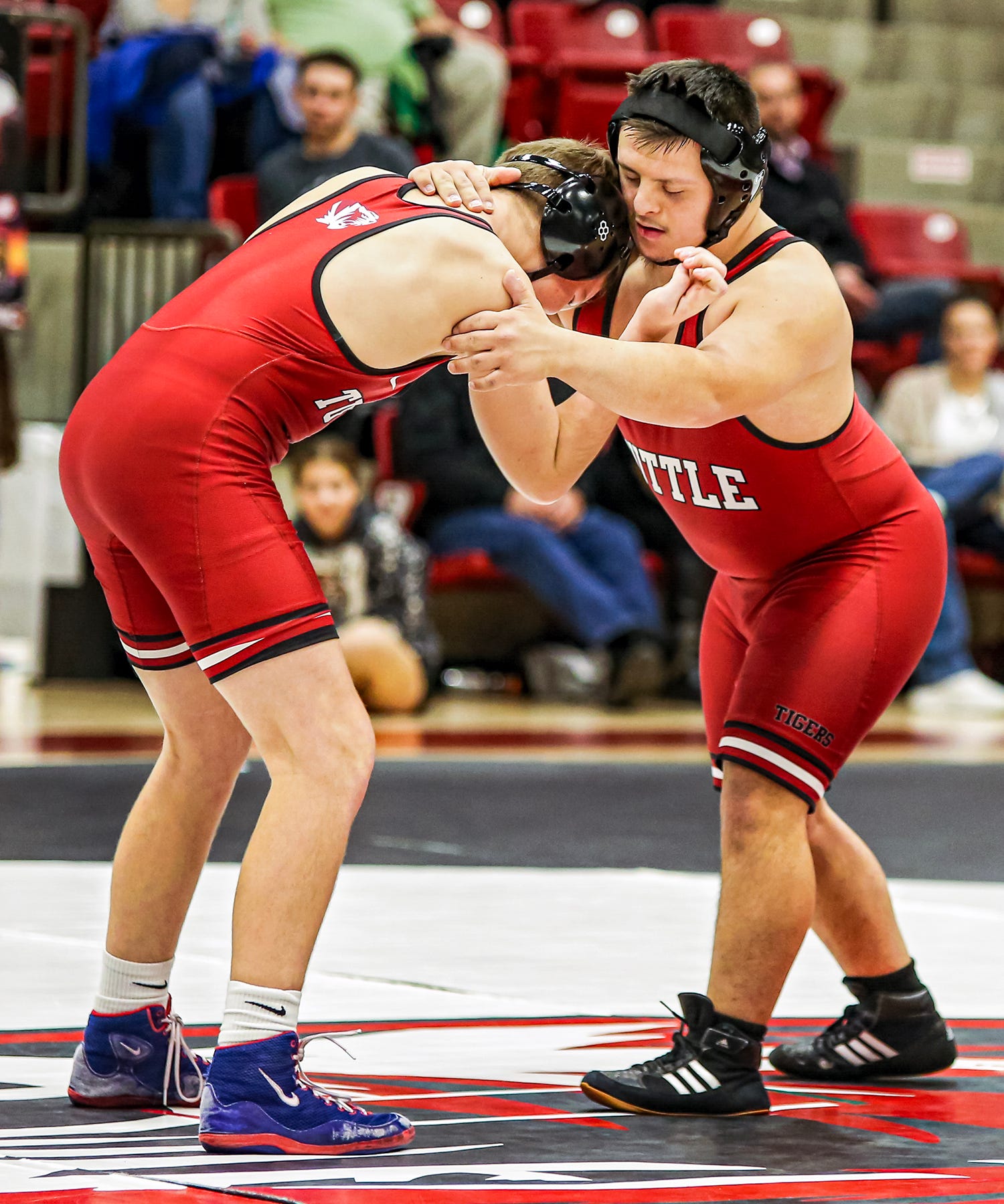 Tuttle High School wrestling proves winning, caring not exclusive