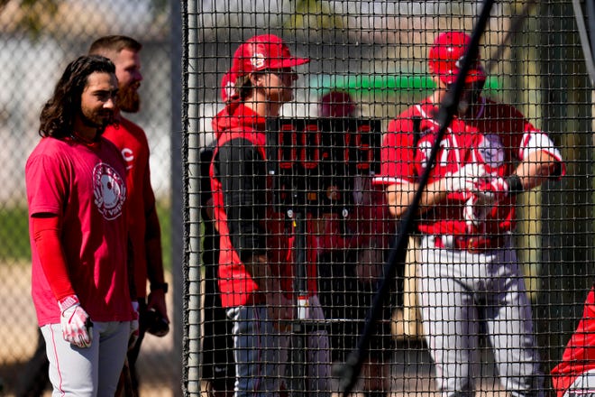 A digital clock stands in for the newly introduced pitch timer during live batting practice at the Cincinnati Reds Player Development Complex in Goodyear, Ariz., on Monday, Feb. 20.