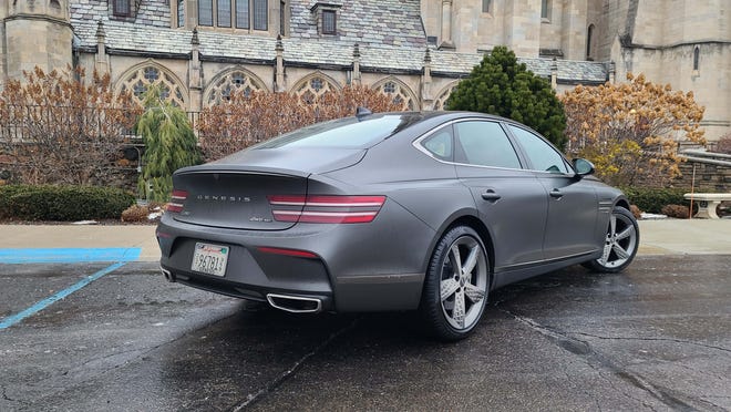 The distinctive split taillights of the 2023 Genesis G80 echo the split headlights.