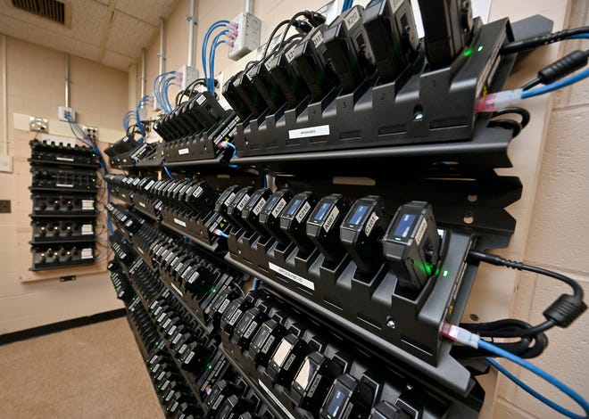 The Police Department's new body cameras in the charging port.