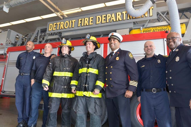 IndyCar stars and Penske teammates Josef Newgarden and Scott McLaughlin (rt) visit Detroit Fire Engine No. 9.