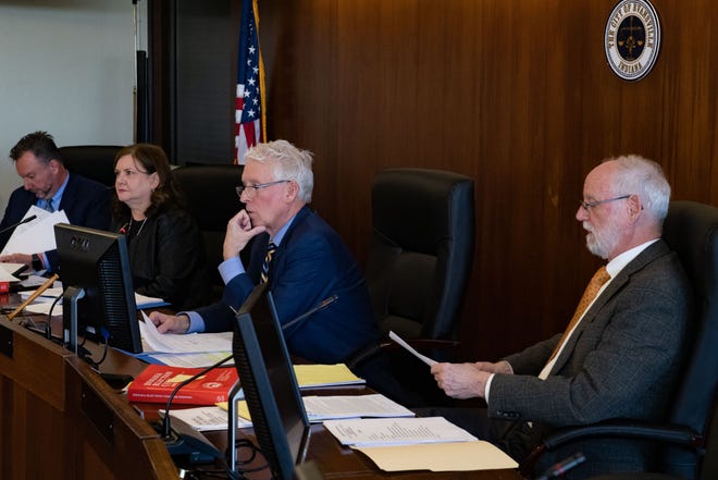 The Vanderburgh County Election Board meets to vote to remove Democrat Brian Alexander and Republican Caine Helmer (not pictured) from the May 2 primary election ballot for mayor at the Civic Center in Evansville, Ind., on Tuesday, Feb. 21, 2023.
