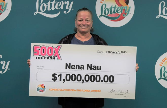 Nena Nau, 55, of Port St. Lucie, pictured here after claiming a lump sum payment of a $1million scratch off card win on Feb. 8, according to Florida Lottery.