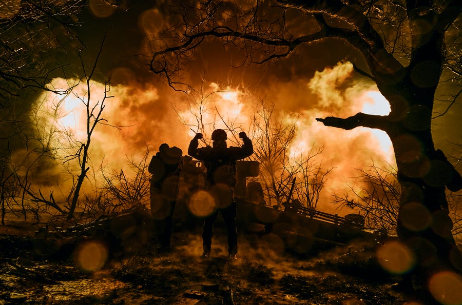 Ukrainian soldiers fire artillery at Russian positions near Bakhmut, Donetsk region, Ukraine, Sunday, Nov. 20, 2022.