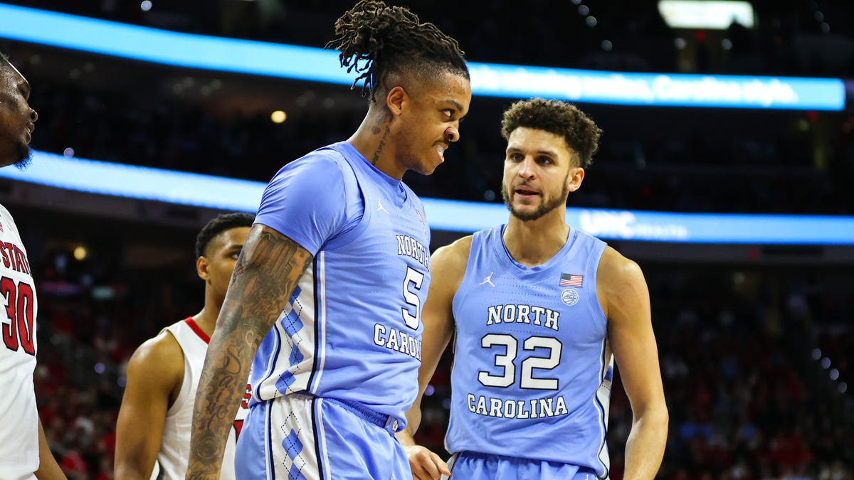 North Carolina forward Armando Bacot (5) and forward Pete Nance (32) react during the second half of their game against North Carolina State at PNC Arena.