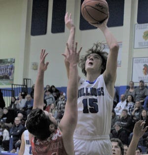 Junior center Sam Schoonmaker (15) and Inland Lakes cruised to a Ski Valley road victory at Forest Area on Tuesday.
