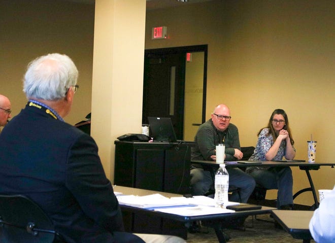 Commissioner Bob Vidricksen (left) listens to County Administrator Phillip Smith-Hanes (middle) and Deputy County Administrator Hannah Bett (right) talk about the Facility Master Plan at a study-session style meeting Feb. 21.