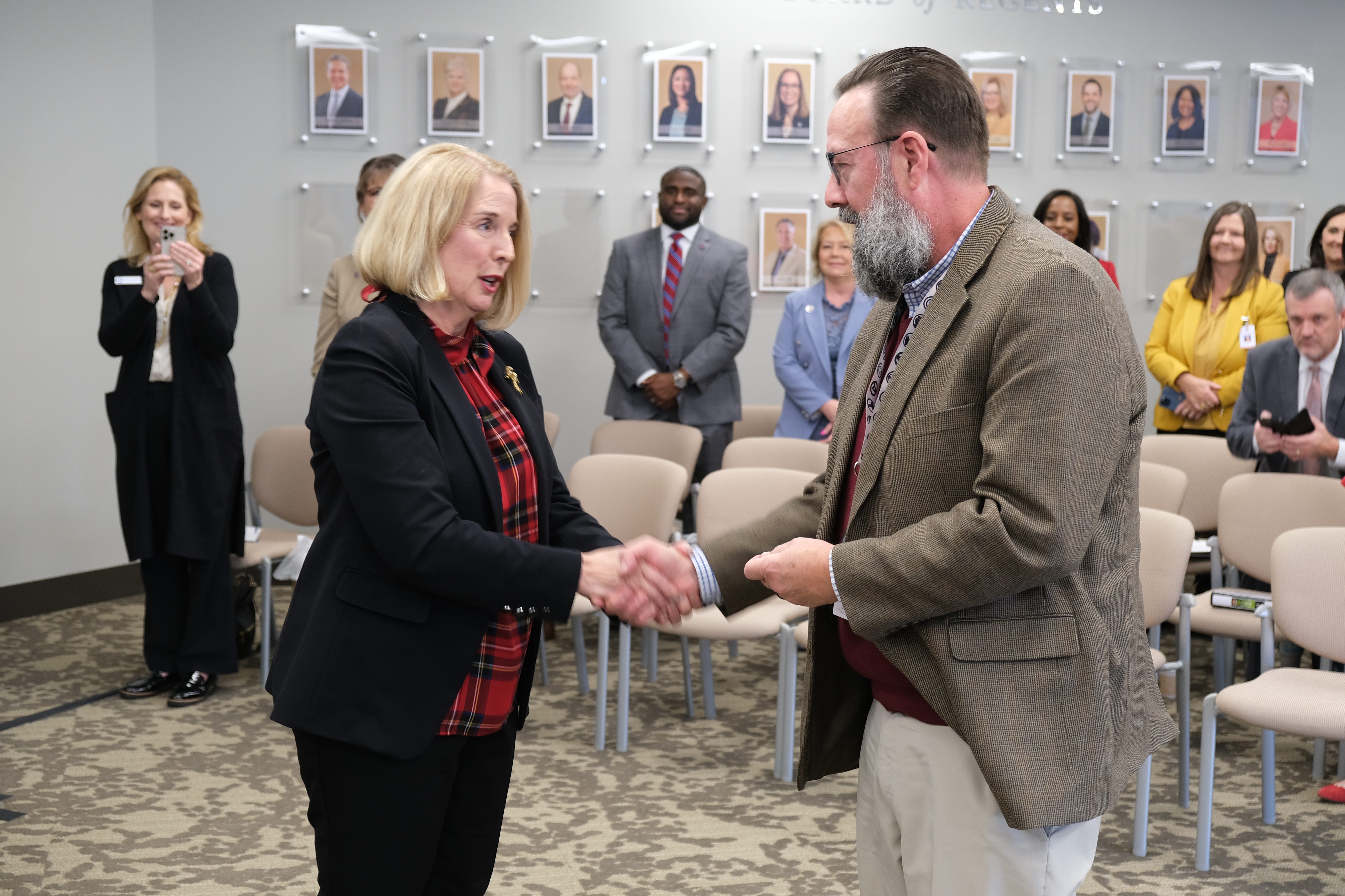 Tennessee Board of Regents Chancellor Flora W. Tydings presents the Chancellor’s Commendation for Military Veterans to Associate Vice Chancellor for Academic Affairs Robert Denn, a veteran of the U.S. Marines, during a ceremony on Dec. 1, 2022. Tydings established the commendation in 2020 to honor veterans on TBR campuses statewide.