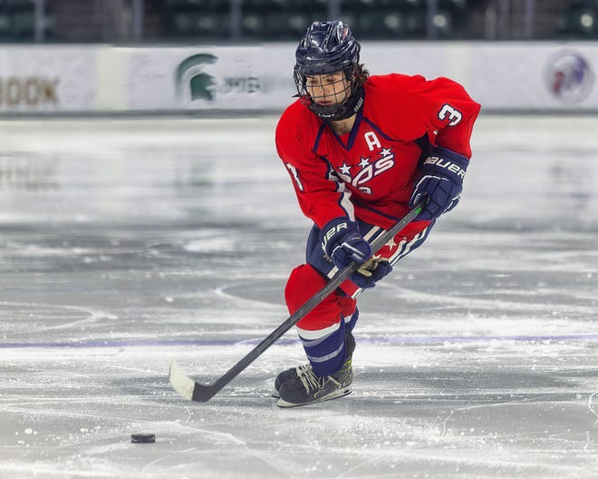 Capital City's Max Tyler carries the puck up the ice in the Capitals' 5-0 victory over Kalamazoo United Tuesday, Feb. 21, 2023 at Munn Ice Arena.