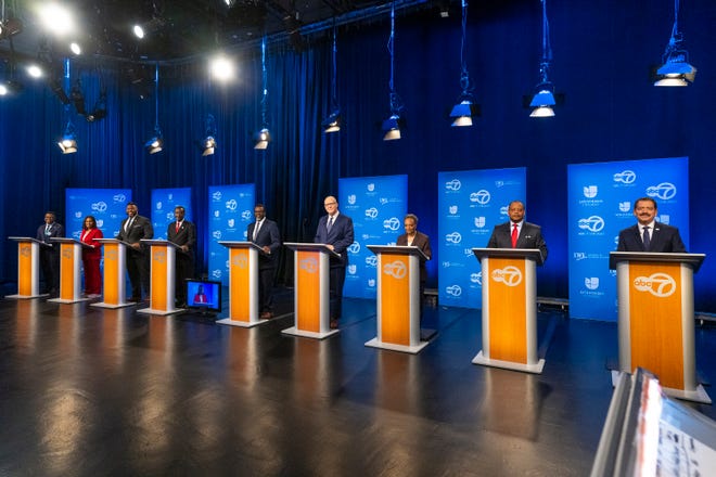 Mayoral candidates (L-R) Ja'Mal Green, Sophia King, Kam Buckner, Wille Wilson, Brandon Johnson, Paul Vallas, Lori Lightfoot, Roderick Sawyer and Jesus Chuy Garcia get ready to debate one another at WLS-TV ABC Channel 7 studio on January 19, 2023 in Chicago, Illinois.