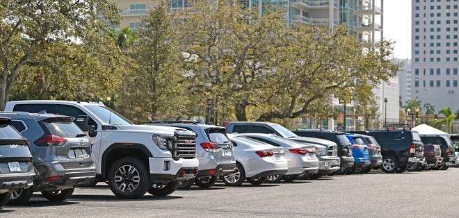 Cars parked at the Sarasota Municipal Auditorium's parking lot on Thursday, Feb. 23, 2023. Back-in parking is allowed there, unlike in many of the city's parking areas.