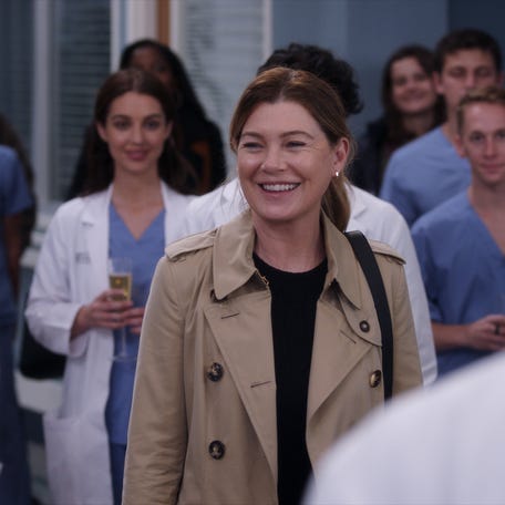 Doctors bid Meredith Grey (Ellen Pompeo, center) goodbye at a surprise farewell party before she leaves for Boston.