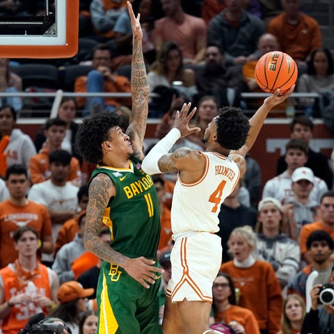 Texas guard Tyrese Hunter (4) shoots over Baylor f