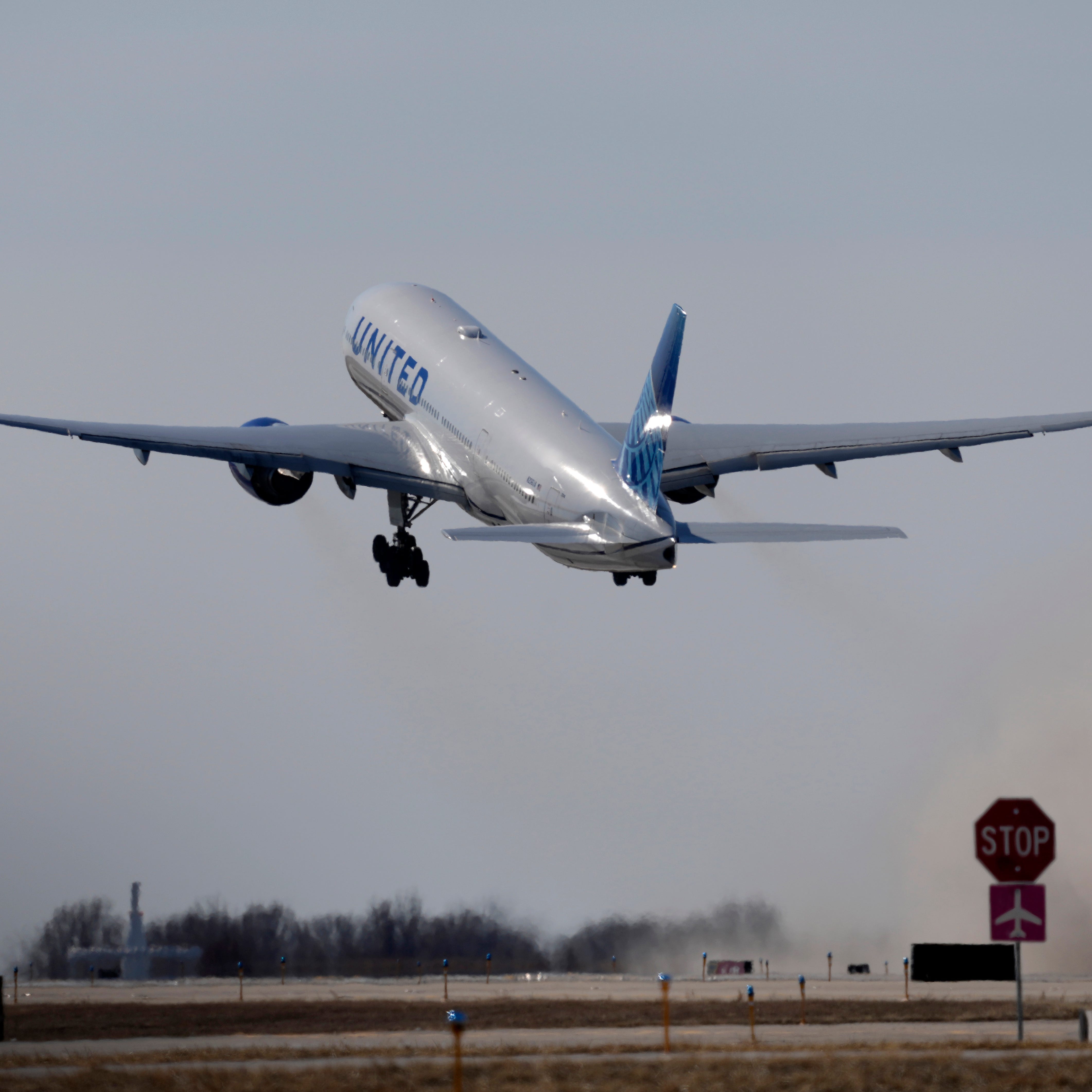 A United Airlines jet takes off Sunday, Feb. 5, 2023, in Kansas City, Missouri. (AP Photo/Charlie Riedel)
