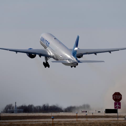 A United Airlines jet takes off Sunday, Feb. 5, 20