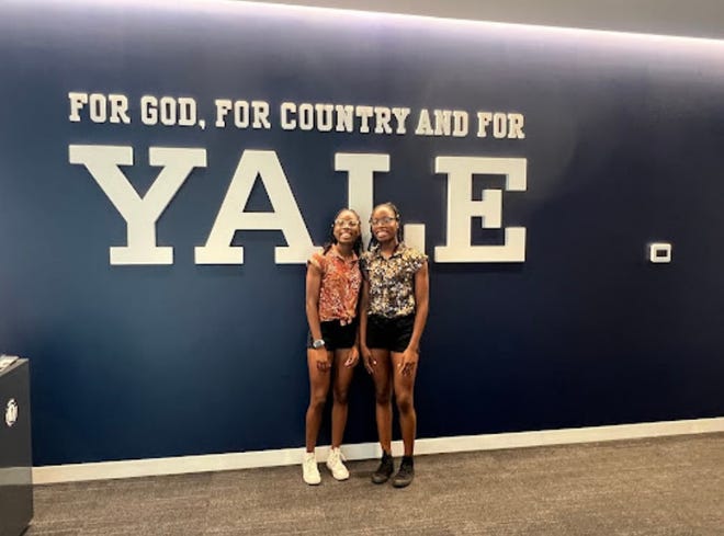 Twins Gloria Guerrier and Victoria Guerrier, graduates of West Hempstead Secondary School. Gloria earned a GPA of 105.3 and was named 2023 valedictorian. Victoria earned a GPA of 104.9 and was named 2023 salutatorian. The pair will be attending Yale University.