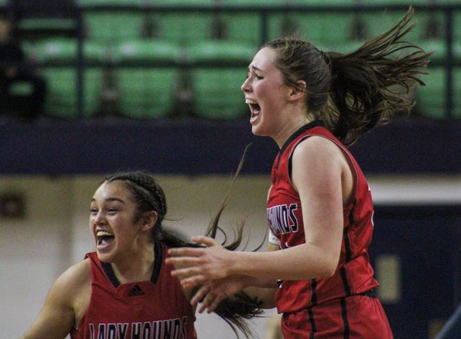 Gruver players celebrate their 38-36 win over Panhandle in the Region I-2A girls basketball tournament championship game in the Texan Dome at Levelland on Saturday, Feb. 25, 2023.