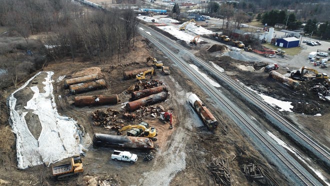 Cleanup continues Saturday, Feb. 25, 2023, at the site of the East Palestine, Ohio, train derailment that released hazardous chemicals into the town's ground and water.