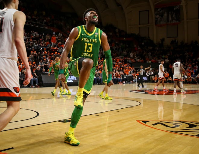 Oregon forward Quincy Guerrier celebrates as the Oregon Ducks take on the Oregon State Beavers at Gill Coliseum Saturday, Feb. 25, 2023, in Corvallis, Ore.
