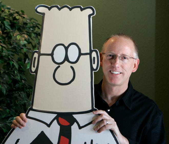 Scott Adams, creator of the comic strip Dilbert, poses for a portrait with the Dilbert character at his studio in Dublin, California.  October 26, 2006.  Several major media publishers across the US are dropping the Dilbert comic strip after Adams, its creator, criticized black people during an online video show. 