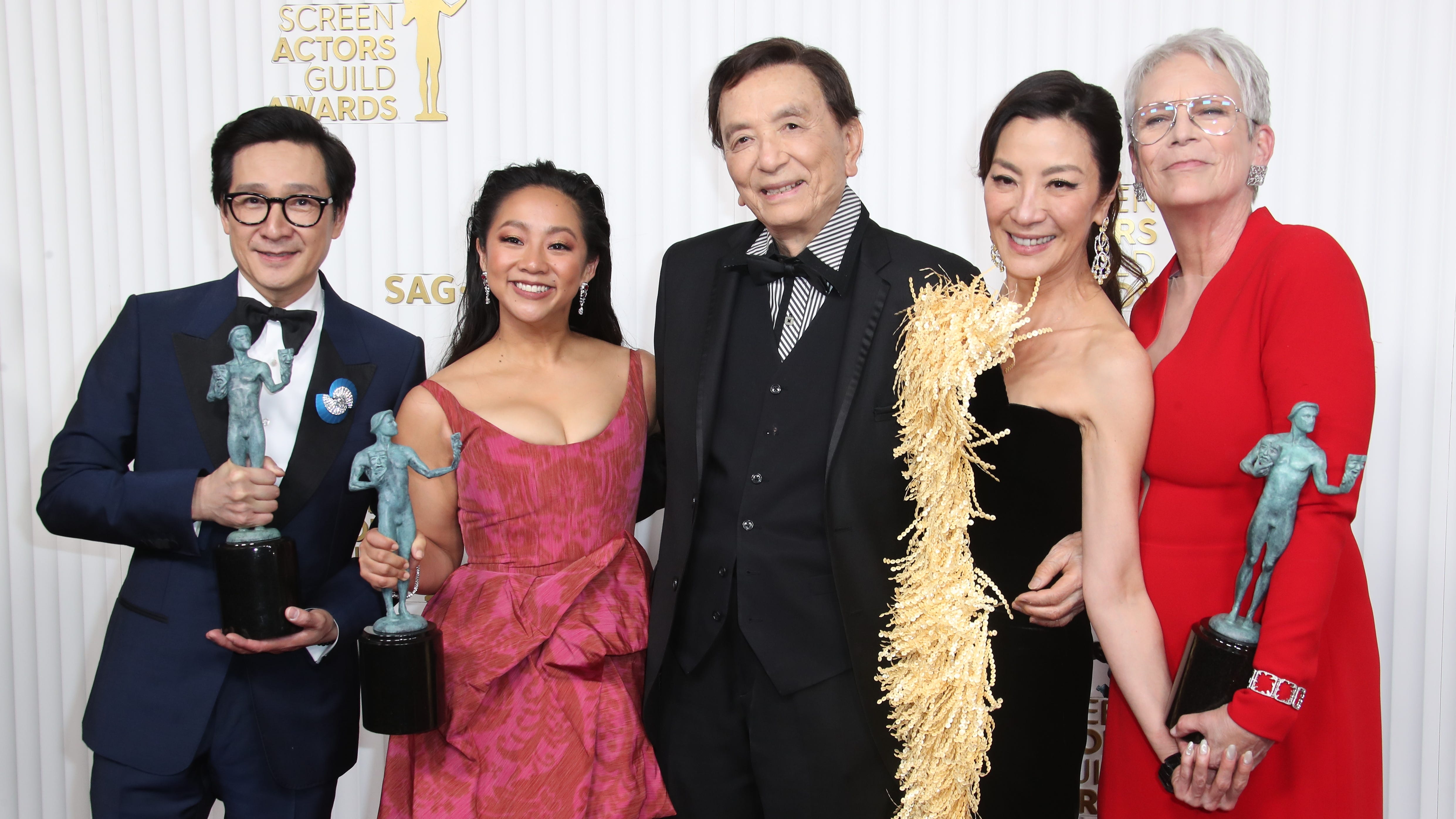 "Everything Everywhere All at Once" stars Ke Huy Quan (from left), Stephanie Hsu, James Hong, Michelle Yeoh and Jamie Lee Curtis pose with their trophies for best cast at the Screen Actors Guild Awards.