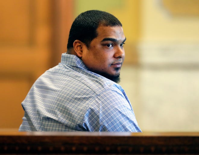 Pedro Santiago-Marquez, who is charged with first-degree intentional homicide and mutilating a corpse, both as party to a crime, looks back in the courtroom during his jury trial at the Brown County Courthouse on Feb. 28, 2023, in Green Bay, Wis.