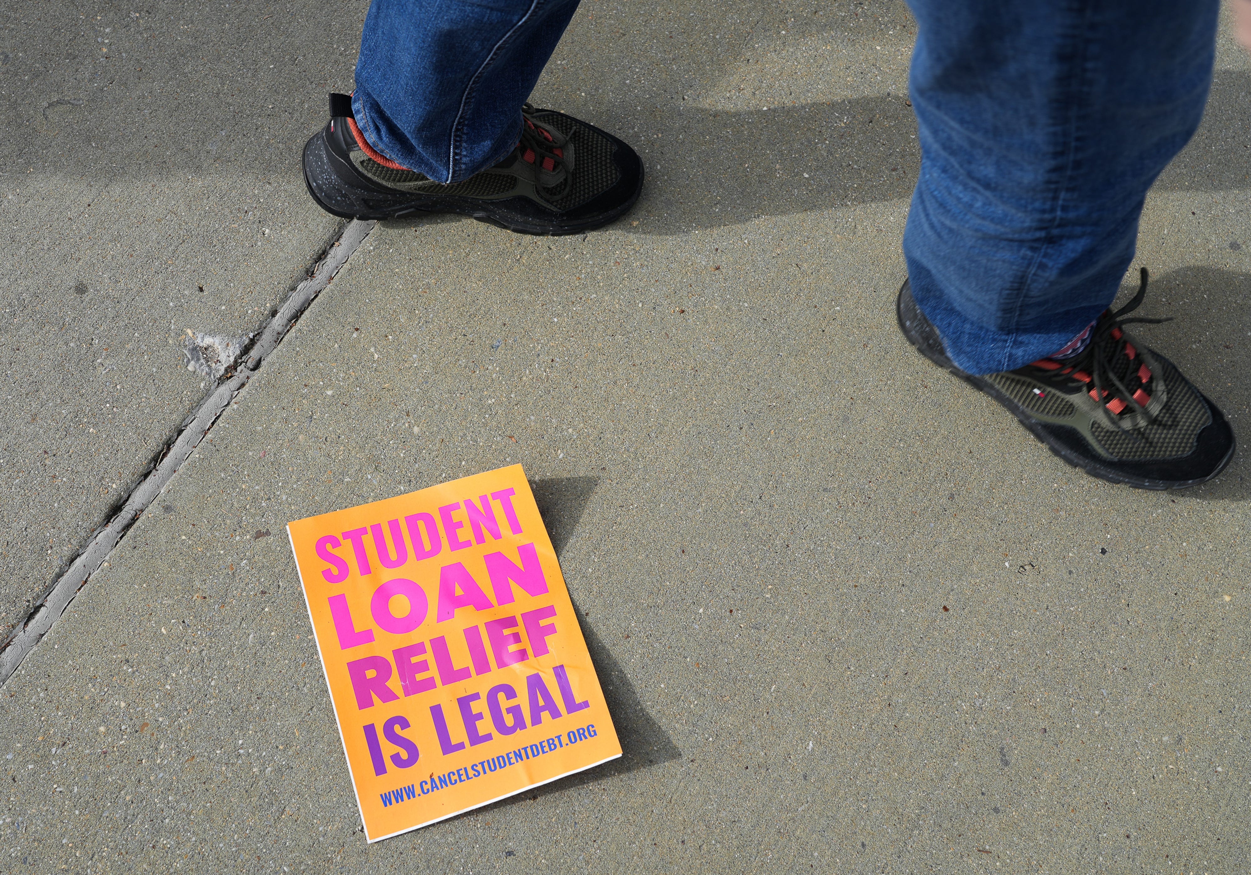 Feb 28, 2023; Washington, DC, USA; Protestors gather outside the U.S. Supreme Court ahead of the oral arguments in two cases that challenge President Joe Biden's $400 billion student loan forgiveness plan.. Mandatory Credit: Megan Smith-USA TODAY ORG XMIT: USAT-525817 (Via OlyDrop)