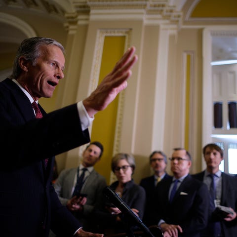 Sen. John Thune (R-SD) talks to reporters during a