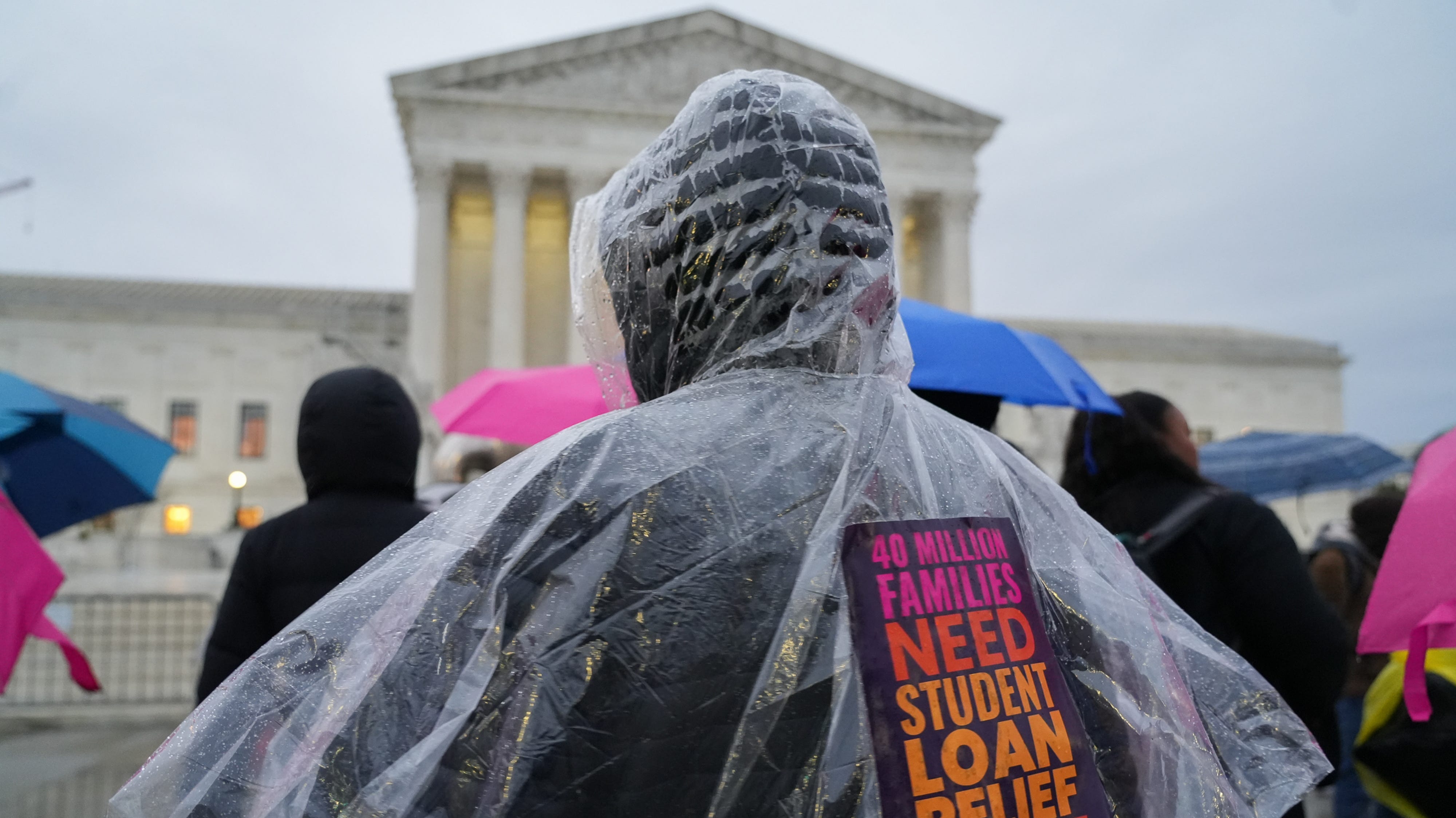 Protestors gather outside the U.S. Supreme Court on Feb. 27, 2023 in Washington, D.C., ahead of the oral arguments in two cases that challenge President Joe Biden's $400 billion student loan forgiveness plan.