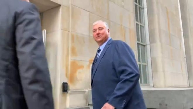 Ex-Ohio House Speaker Larry Householder enters the courthouse Wednesday. He is expected to take the stand in his own defense