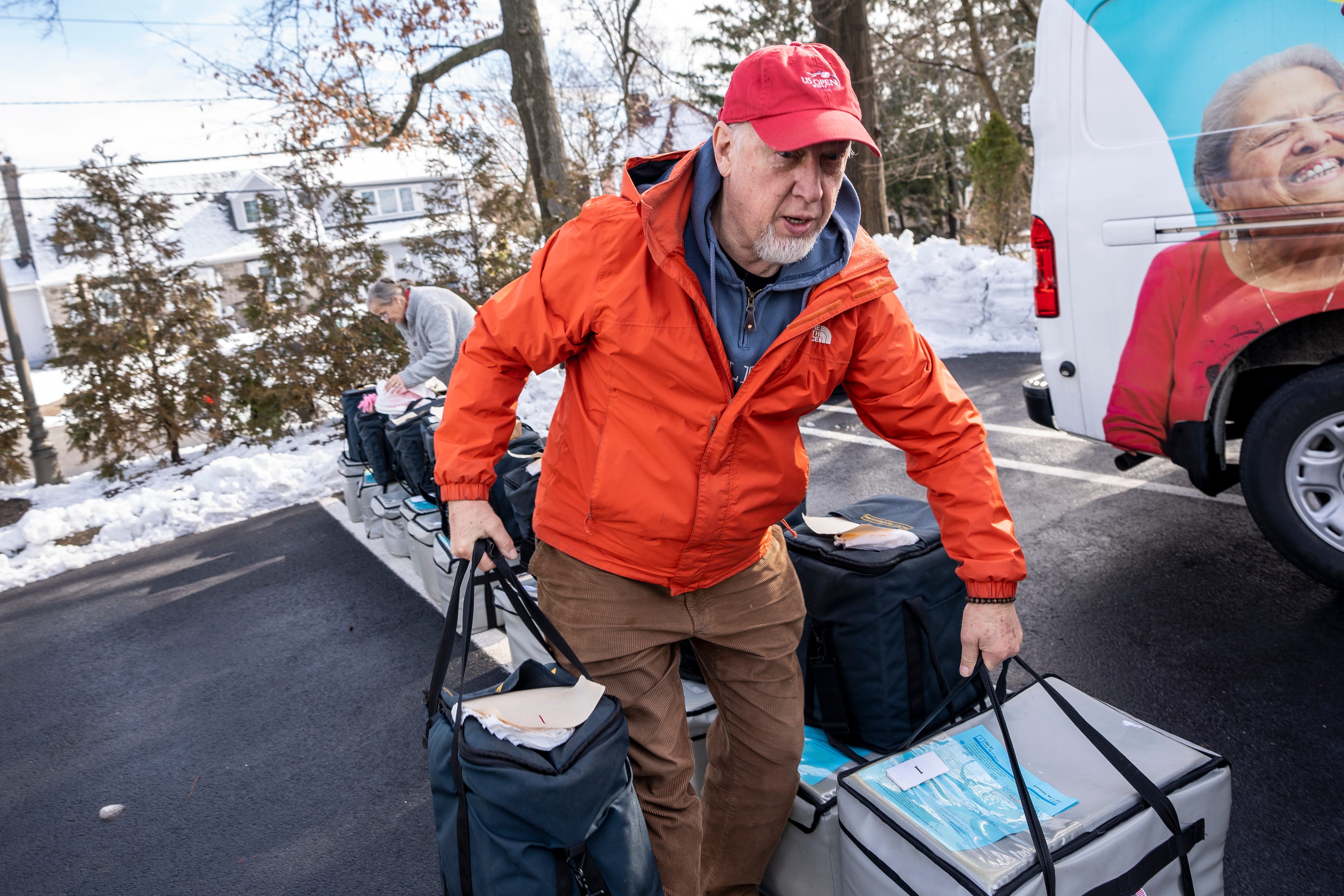 Meals on Wheels volunteer delivering food