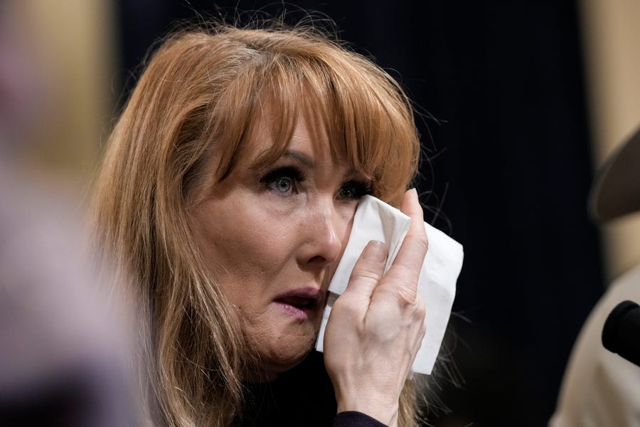 WASHINGTON, DC - FEBRUARY 28: Rebecca Kiessling, a mother from Michigan who lost two sons to fentanyl poisoning, wipes away tears during a House Homeland Security Committee about the U.S-Mexico border on Capitol Hill February 28, 2023 in Washington, DC. This is the committee's first hearing on border security since the Republicans took control of the House.