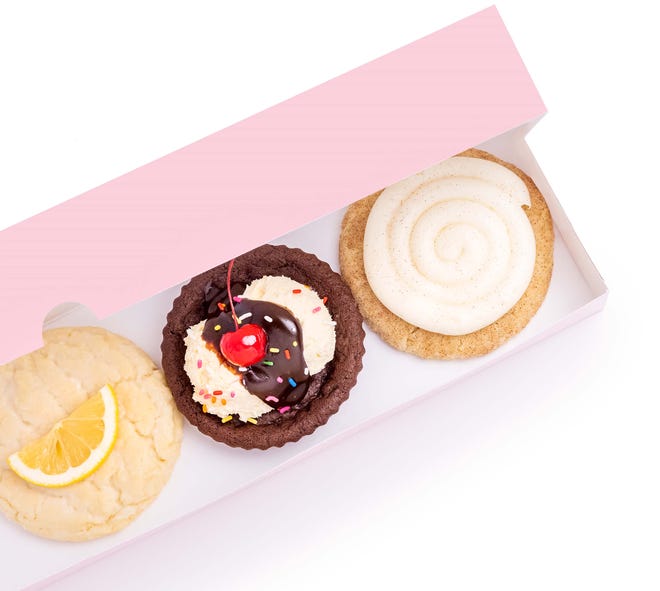 Clumbl Cookies’ signature pink box is designed to fit each cookie side-by-side.