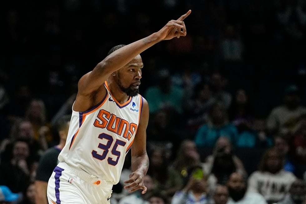 Phoenix Suns forward Kevin Durant celebrates after scoring during the first half of an NBA basketball game against the Charlotte Hornets on Wednesday, March 1, 2023, in Charlotte, N.C.