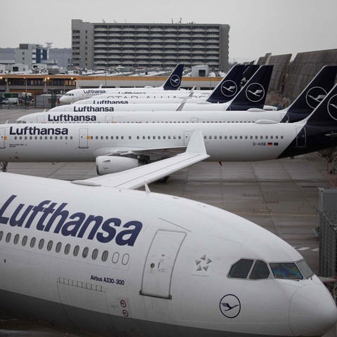 Planes of German airline Lufthansa are seen parked