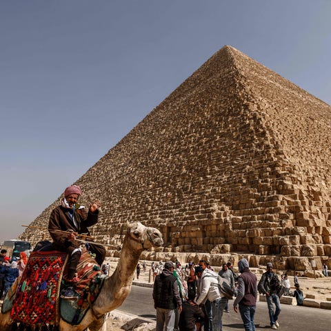 Tourists visit the Great Pyramid of Khufu (Cheops)