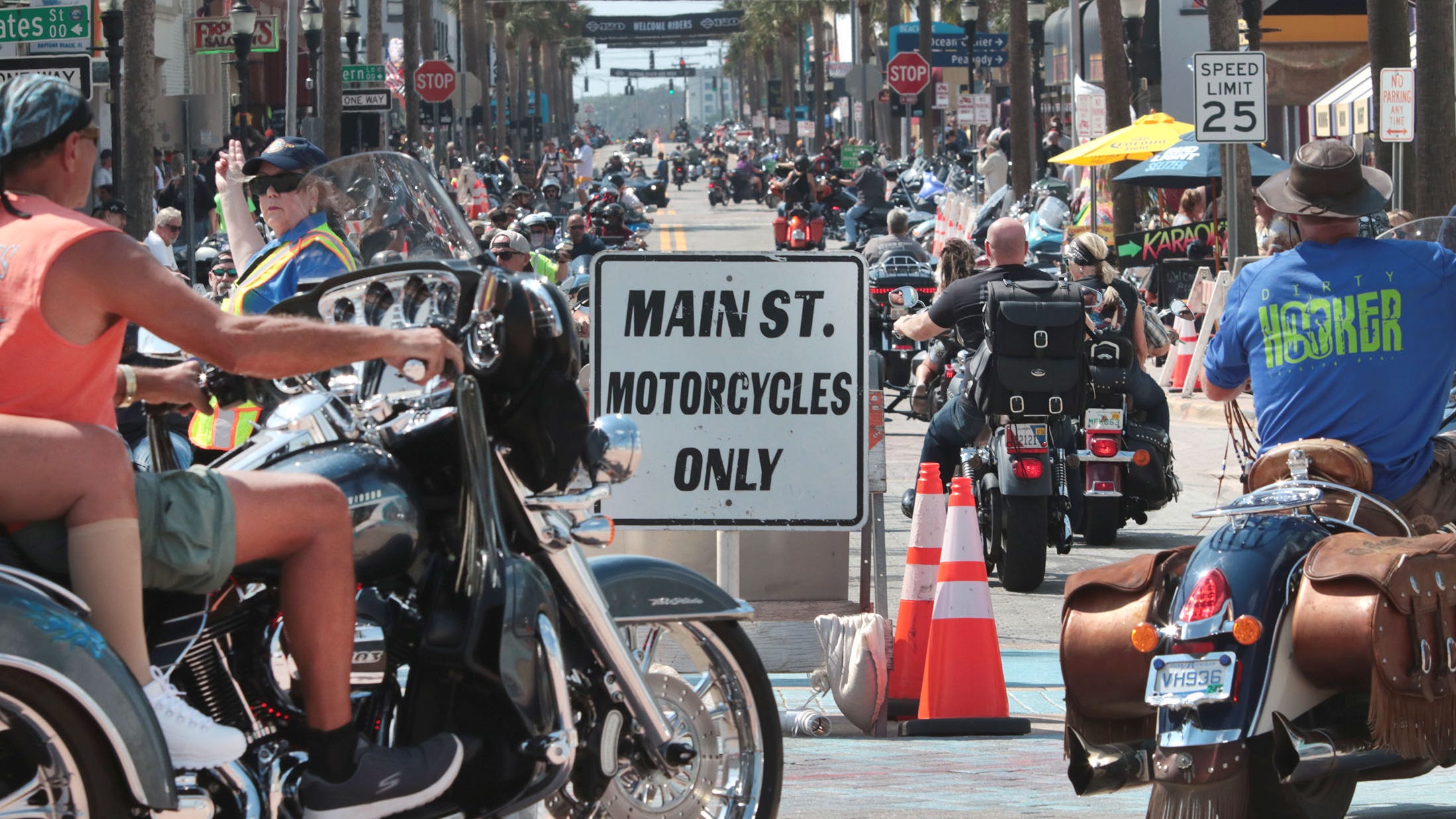 Motorcycles rumble along Main Street in Daytona Beach on opening day of