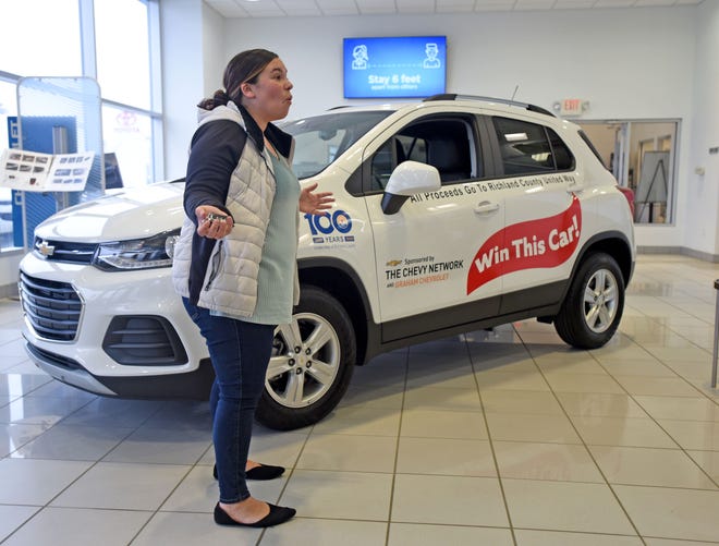Ashley Leadingham reacts to winning a 2022 Chevrolet Trax in a drawing on Friday supporting the Richland County United Way. "I'm just flabbergasted," she said, adding that she's never owned a new car.