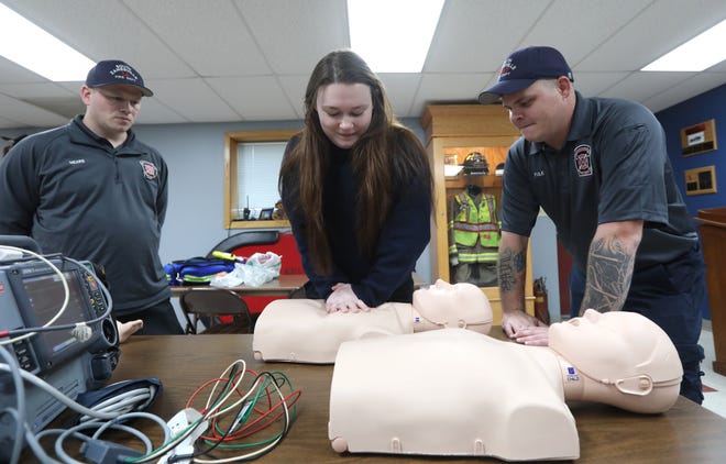 South Zanesville Fire Department trainee Breawna Gillogly does training with Firefighter/Paramedic Mike Fulk, right, and Firefighter/EMT John Mears recently. The department does a continuing cycle of training on a variety of subjects to keep up with required training for its members.