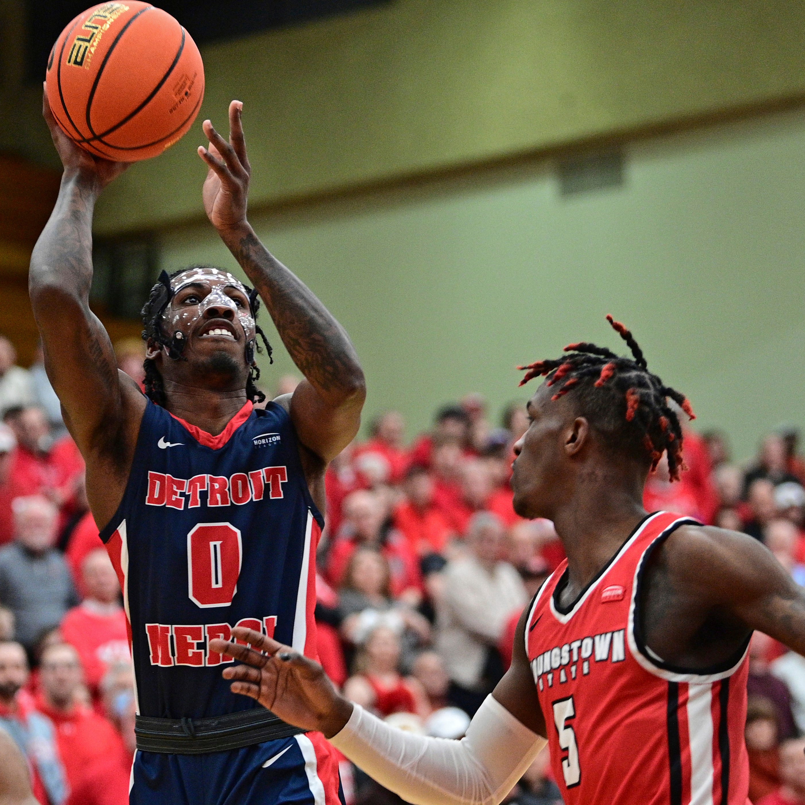 Detroit Mercy's Antoine Davis shoots against Youngstown State during the quarterfinals of the Horizon League tournament.OHDD102