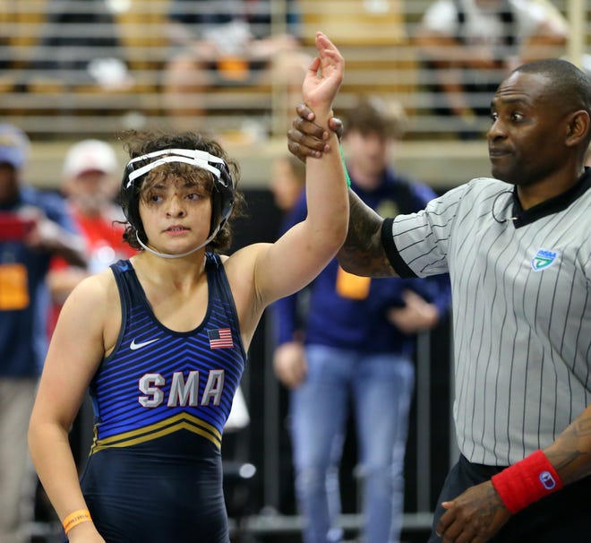 Sarasota Military Academy's Christina Turner advances to the girls 125-pound final at the FHSAA Wrestling Championships on Friday at Silver Spurs Arena in Kissimmee.