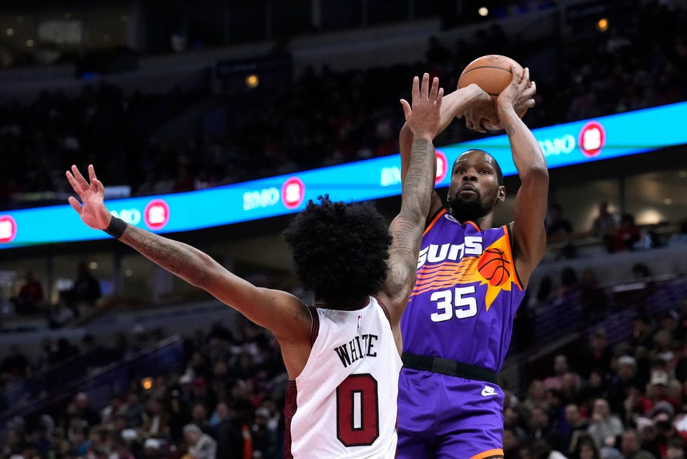 Phoenix Suns' Kevin Durant shoots over Chicago Bulls' Coby White during the first half of an NBA basketball game on March 3, 2023, in Chicago.