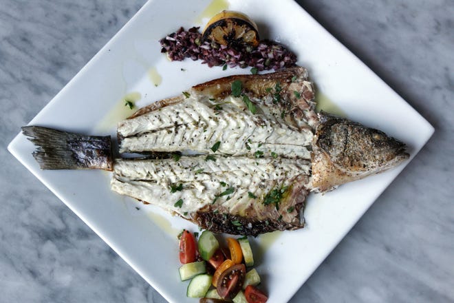 Branzino is an elegant Italian seafood specialty served at Rosalina. It's Mediterranean sea bass, grilled and served deboned.