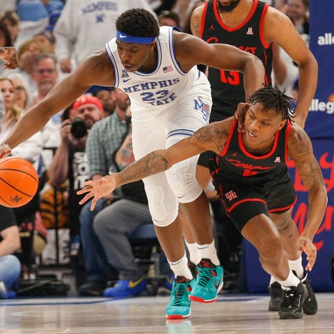 Memphis Tigers forward Malcolm Dandridge (23) and 
