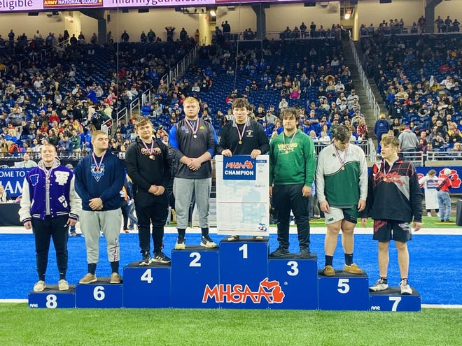 Cheboygan senior Devihn Wichlacz (third from left) earned a fourth-place finish in the 285-pound weight division during the MHSAA Division 3 individual wrestling state finals at Ford Field in Detroit on Saturday.