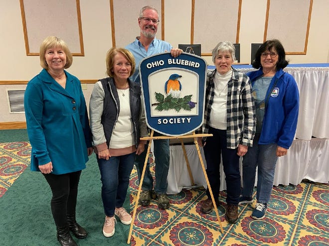 Ohio Bluebird Society Board member Mark Dilley, center, of Westerville joined Earth, Wind and Flowers Garden Club members, from left, Beverly Sipe, Glenda Leuthold, Cheryl Corney and Mary Lee Minor at the end of the OBS Conference March 4.